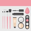 Flat makeup and cosmetics products and tools. Lipstic, brushes, eyeshadow mascara, powder and mascara.