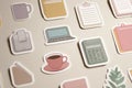 Flat Minimalist Stickers of Office Tools Arranged on a Neutral Backdrop With Ample Space at the Top for Text or Design Royalty Free Stock Photo