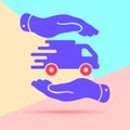 Flat modern pastel colored art design of two hands with flat truck pictogram on pink and blue background Royalty Free Stock Photo