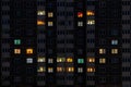 Flat night panorama of multicolor smile face light in windows of multistory buildings