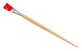 Flat paint brush with red tip and wooden handle