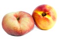 Flat peach and nectarine.Close up on a white background Royalty Free Stock Photo