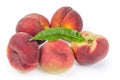 Flat and ordinary peaches with leaf on a white background Royalty Free Stock Photo