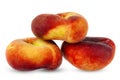 Flat peaches, close-up on a white background. Royalty Free Stock Photo