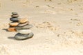 flat pebbles laid on the sandy beach sea coast