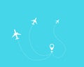 Flat plane and its track on blue background. Royalty Free Stock Photo