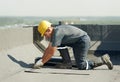 Flat roof covering works with roofing felt