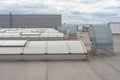 Flat roof with many large skylights and hydro insulation membranes