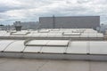 Flat roof with many large skylights and hydro insulation membranes