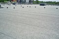 Flat roof protective covering with bitumen membrane for waterproofing Royalty Free Stock Photo