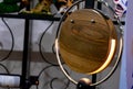 Flat round table lamp made of wood