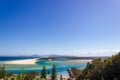 Flat sand dunes at delta of Nambucca river entering Pacific ocean through wide sandy beach of Australian coast around Nambucca Royalty Free Stock Photo