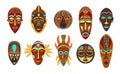 Flat set of colorful african ethnic tribal ritual masks of different shape isolated on white background.