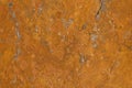 A flat stone surface rusting due to the iron ore it contains. A rust pattern / texture with marble like structure. Royalty Free Stock Photo