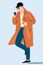 Vector illustration of a young man in a coat with a phone in his hand Royalty Free Stock Photo