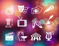 Symbols of culture, arts and entertainment on the Colorful background with defocused lights Royalty Free Stock Photo