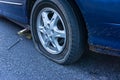 Flat tire on the road Royalty Free Stock Photo