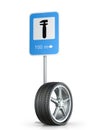 Flat tire with road sign Royalty Free Stock Photo