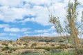 Flat topped plateau hill in the rural village of Ghasri, Gozo, Malta, with the Ta Giordan lighthou