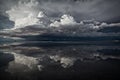 Flat uyuni salt and desert , infinite mirror and water, blue, sunset, landscape, siluettes, storms, beautiful, awesome, paradise, Royalty Free Stock Photo