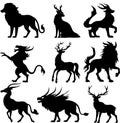 silhouetted mythical creatures including dragons lions and deer Royalty Free Stock Photo