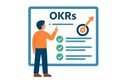 Flat vector person setting OKRs (Objectives and Key Results) on digital board, goal alignment, isolated Royalty Free Stock Photo