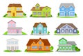 Flat vector set of colorful houses with green meadow, bushes and trees. Cozy residential cottages. Traditional Royalty Free Stock Photo