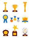 Flat vector set of different prizes. Shiny golden cups, golden rosette with ribbon, medals, glass award. Trophies for Royalty Free Stock Photo