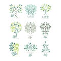 Flat vector set of life logo templates with silhouettes of human and green leaves. Abstract emblems for yoga studio