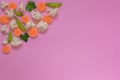 Flat vegetables on a pink background