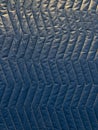 Flat view of a blue moving blanket with defined texture