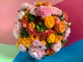 Flat view bright colorful pink yellow orange persian asian buttercup ranunculus asiaticus flowers in round box Royalty Free Stock Photo