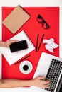 Flat view of the office desk with a creative arrangement of stationery and notebooks for the desktop