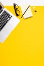 Flat view of the office desk with a creative arrangement of stationery and notebooks for the desktop