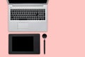 Flat view of opened laptop computer and modern retouching tablet, stylus, needed for creative work and retouching photos, isolated