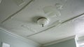 Flat view of painted bathroom ceiling with light roller texture and moisture specks Royalty Free Stock Photo