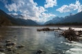 Flat water of rural river with stones