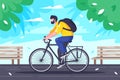 Flat young man with backpack rides on cycling at road.