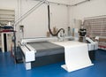 Flatbed cutter plotter in print shop