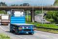 Flatbed lorry truck on uk motorway in fast motion