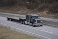 Flatbed Semi Truck on the Highway Royalty Free Stock Photo
