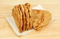 Flatbreads on a chopping board Royalty Free Stock Photo