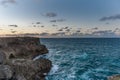 FLATFIELD, BARBADOS - MARCH 18, 2014: Man Photograph Sunset Landscape in Barbados, Next To Animal Flower Cave Royalty Free Stock Photo