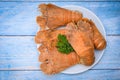 Flathead lobster shrimps served on white plate, Fresh slipper lobster flathead boiled cooking with parsley - top view