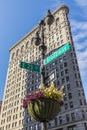 Flatiron building on Manhattan with street sign Broadway Royalty Free Stock Photo