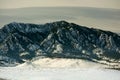 Flatirons Mountains in Boulder, Colorado on a Cold Snowy Winter Royalty Free Stock Photo