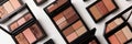 A flatlay of assorted makeup palettes featuring various shades of blush, highlighter, and eyeshadow. Generative AI Royalty Free Stock Photo