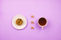 Flatlay with a blueberry muffin, cup of tea and cane sugar cubes