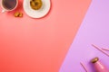 Flatlay with a blueberry muffin and cup of tea on one side and bottle of juice or smoothie with straws on the opposite side. Royalty Free Stock Photo