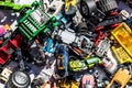 Flatlay of car toys at garage sale for over-consumption Royalty Free Stock Photo